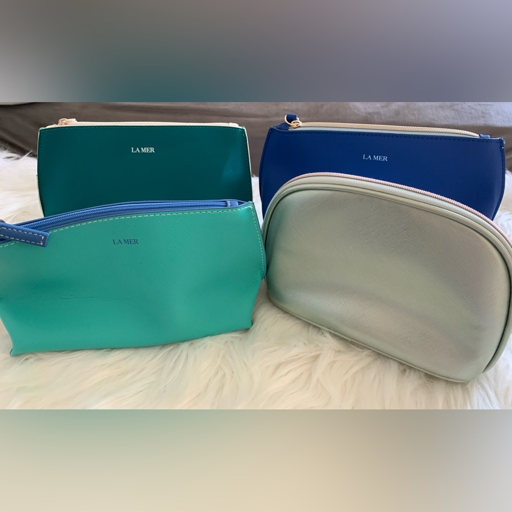 Set of 4 La Mer cosmetic bags